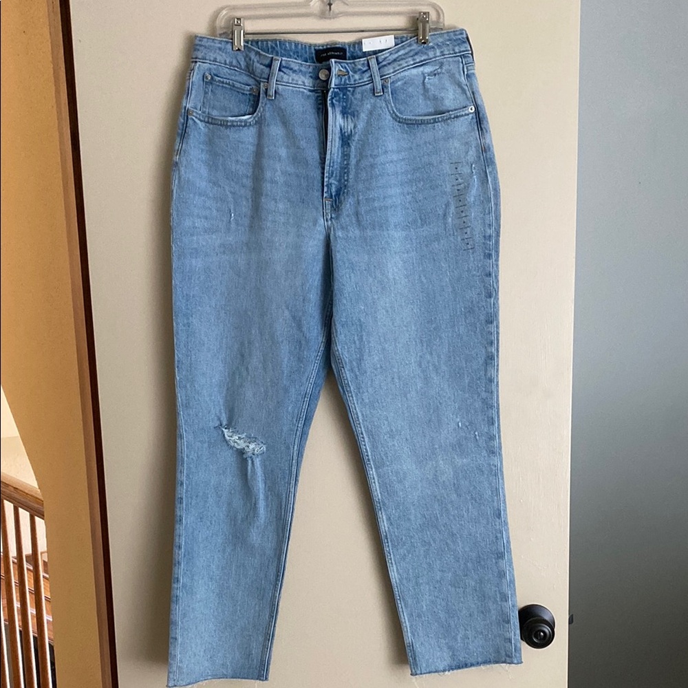 Light Blue Stretchy Straight Leg Jeans with Distressed Detail